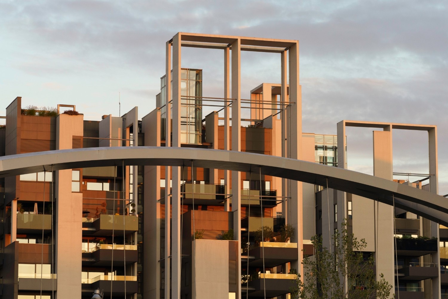 Modern residential architecture with geometric frames and bridge design in urban housing complex